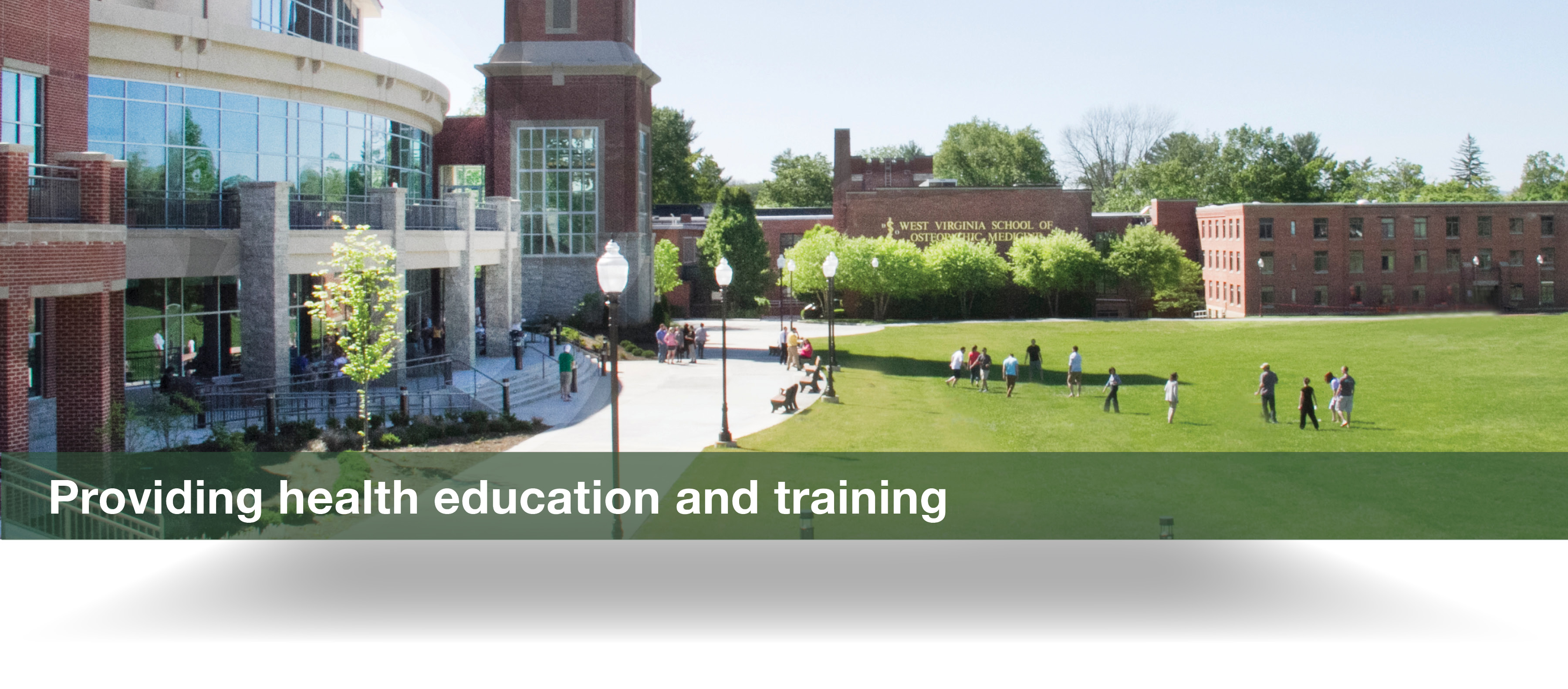 WVSOM student center building with people walking in foreground. Providing health education and training.